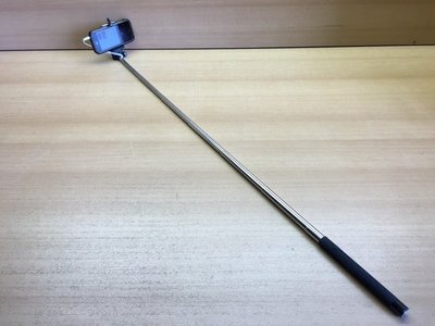 Selfie stick telescopisch met handvatbediening.